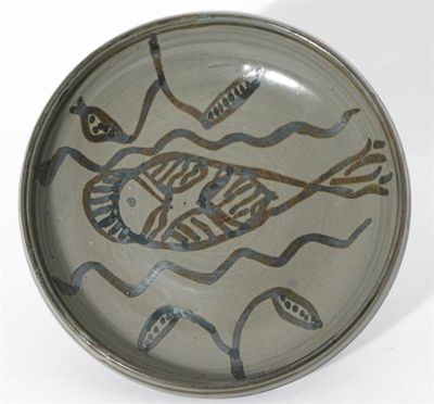 Appraisal: An Abuja Pottery stoneware dish by Ladi Kwali painted to