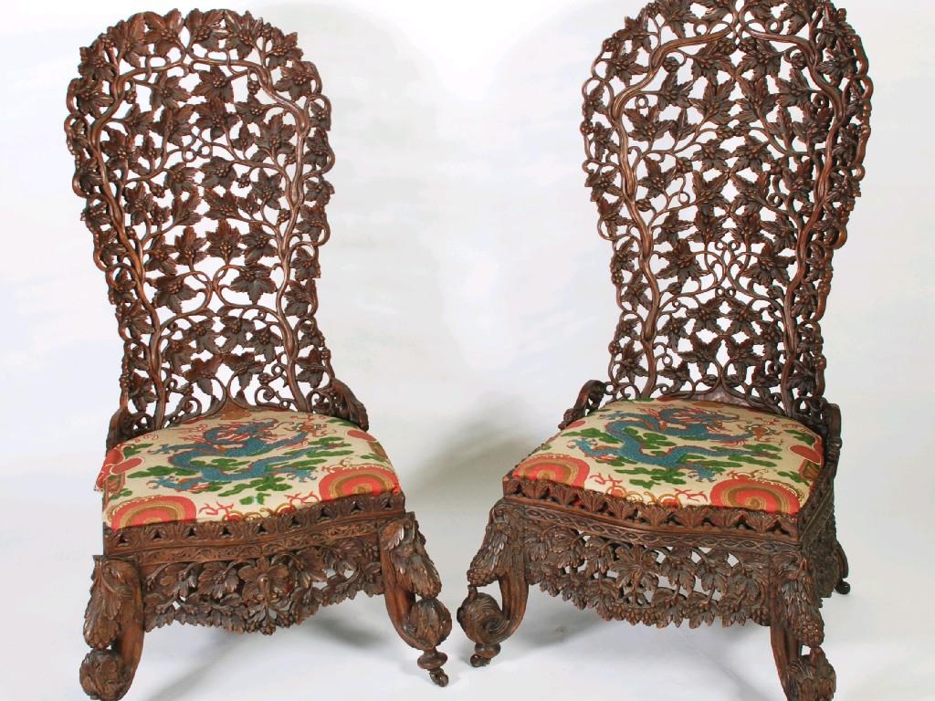 Appraisal: PAIR OF LATE NINETEENTH CENTURY ANGLO-INDIAN PROFUSELY CARVED AND PIERCED