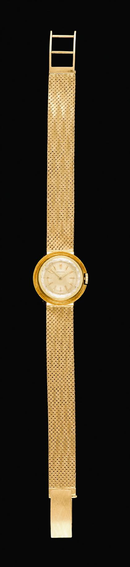 Appraisal: karat yellow gold wristwatch Longines karat yellow gold textured band