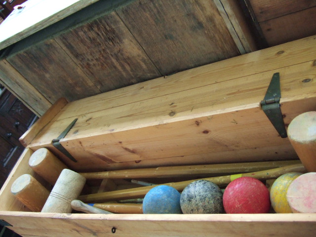 Appraisal: A garden croquet set including mallets balls and iron hoops