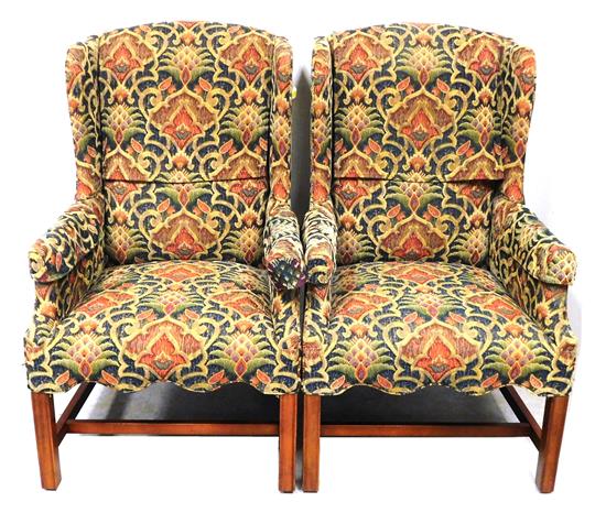 Appraisal: Pair of upholstered wing chairs th C Georgian style with