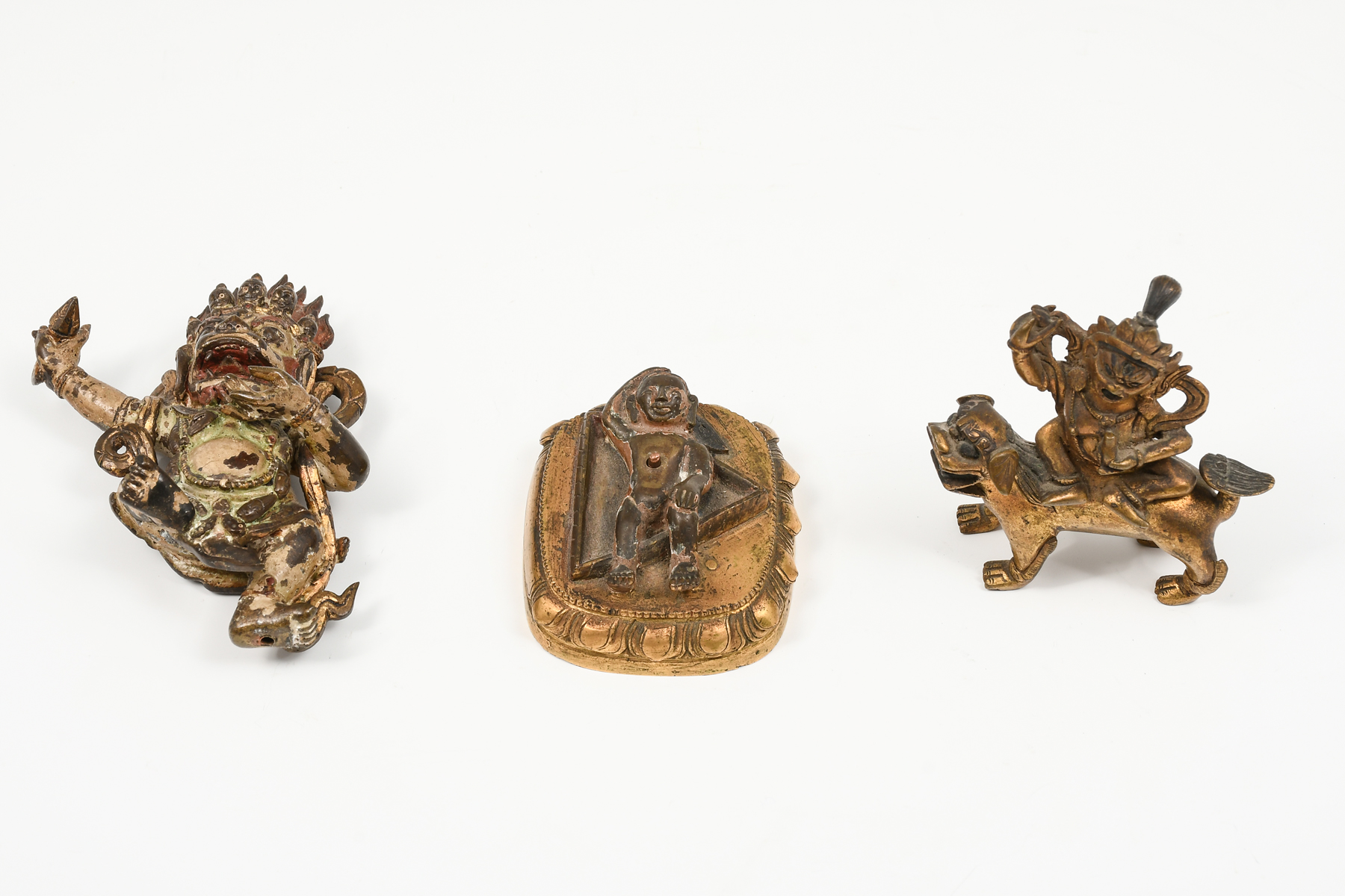 Appraisal: PC SOUTHEAST ASIAN GILT ALTAR BRONZES Collection of Three th-century