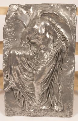 Appraisal: A metallic painted relief wall hanging of a Classical statue