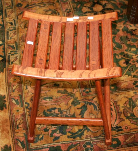 Appraisal: An Arts and Crafts style casuarina stool