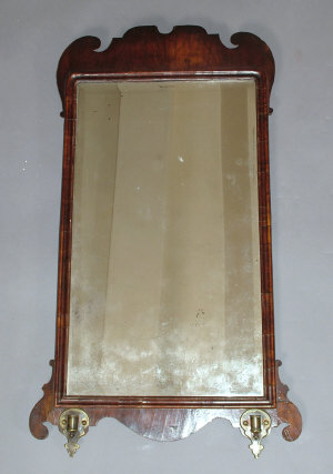 Appraisal: A Chippendale style fretwork wall mirror th century the bevelled