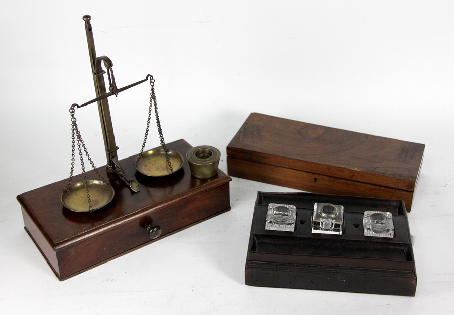 Appraisal: A mahogany cased set of scales the box base fitted