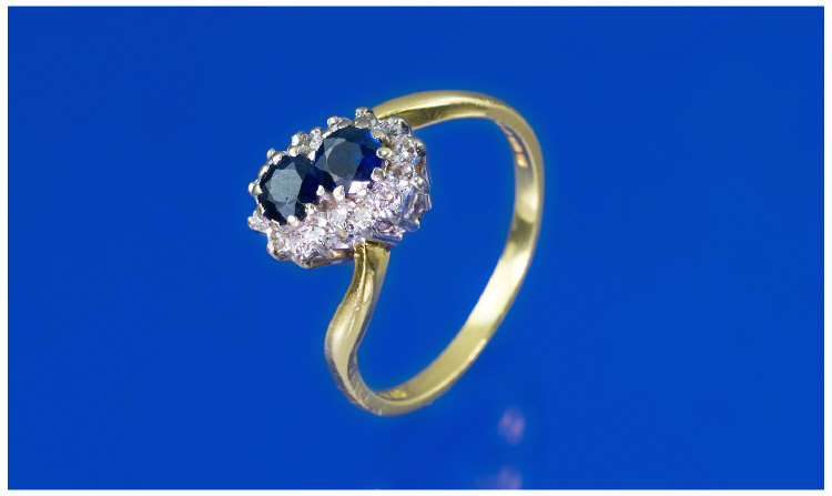 Appraisal: ct Gold Sapphire and Diamond Cluster Ring Two Central Round