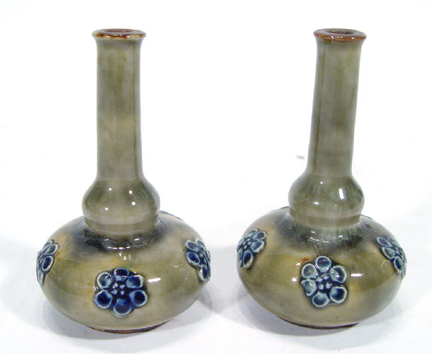 Appraisal: Pair of miniature Royal Doulton stoneware bottle vases with relief