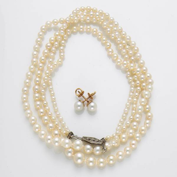 Appraisal: A graduated cultured pearl and silver double strand necklace together