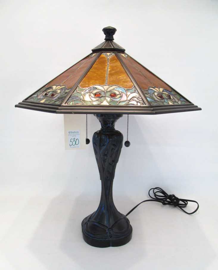 Appraisal: A STAINED AND LEADED GLASS TABLE LAMP octagonal shade having