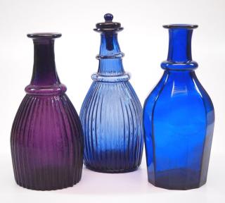 Appraisal: Blown Three early-mid th century blown-molded glass cruet toilet bottles