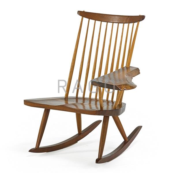 Appraisal: GEORGE NAKASHIMA Rocking Chair With Arm Condition Report Darkened shallow