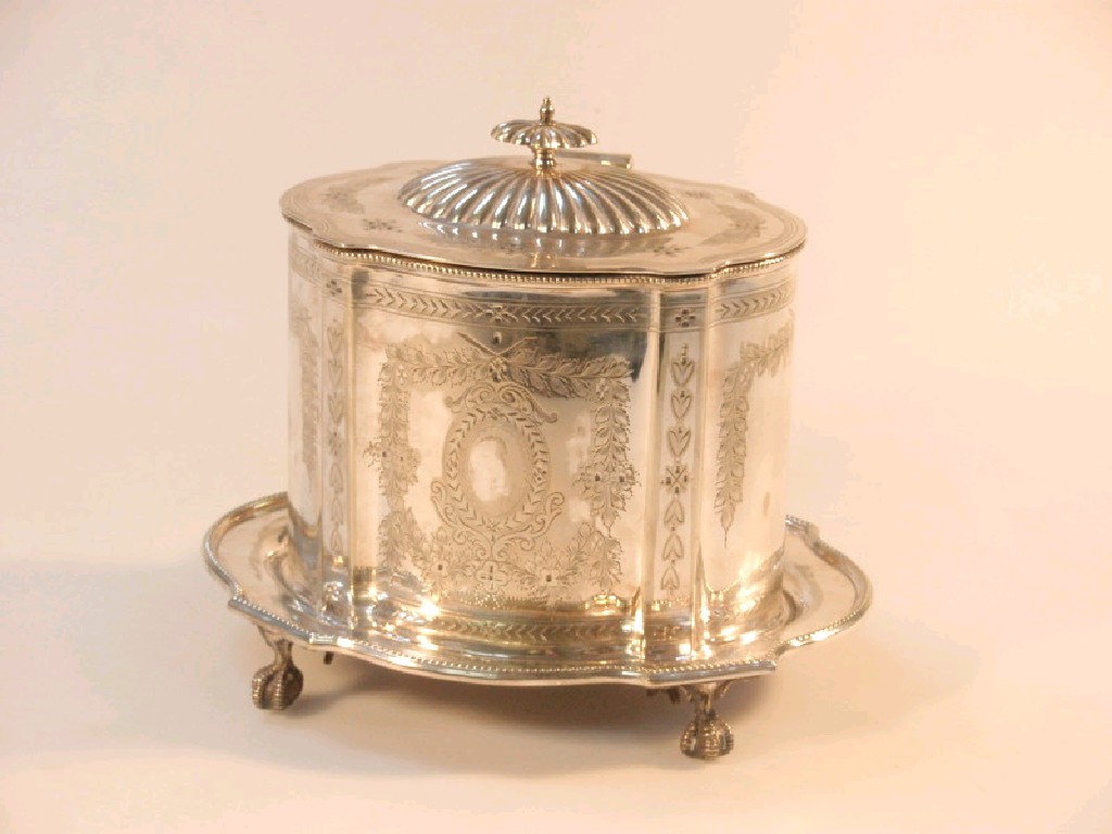 Appraisal: An Edwardian electroplated biscuit barrel with hinged cover and integral