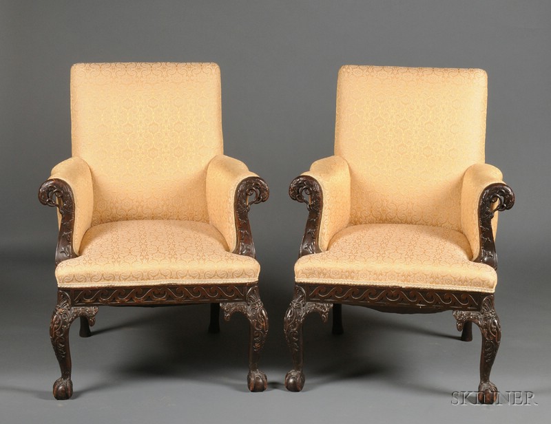 Appraisal: Pair of Early Georgian-style Carved Mahogany Library Chairs th century