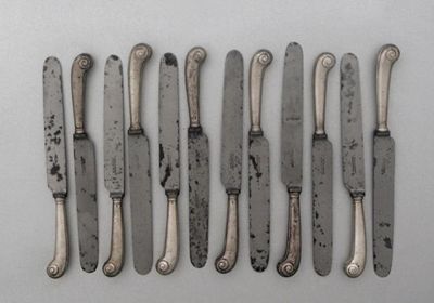 Appraisal: Twelve rare George II Irish table knives with scroll pistol