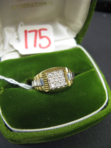 Appraisal: MAN'S DIAMOND CLUSTER RING K gold Rolex-style jubilee setting centering