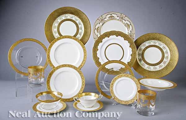 Appraisal: An Extensive Porcelain Dinner Service with Raised Gilt Decoration mid-