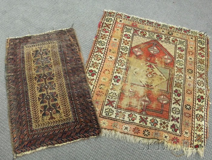 Appraisal: Two Oriental Rugs th century Anatolian prayer rug ft in