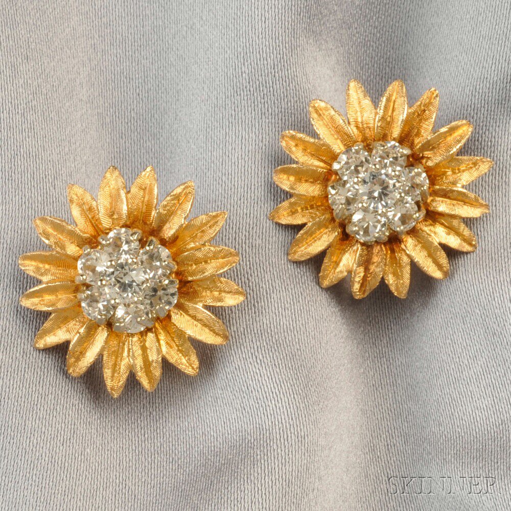 Appraisal: kt Gold and Simulated Diamond Flower Earclips dwt dia in