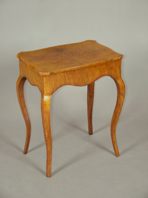 Appraisal: A French walnut occasional table late th century the quarter