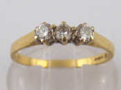 Appraisal: An carat gold three stone diamond ring estimated total diamond