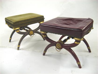 Appraisal: Pair of similar Neoclassical style footstools The red leather tops