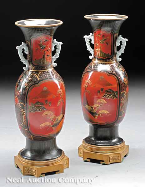 Appraisal: A Pair of Japanese Earthenware Vases on Bronze Plinths the