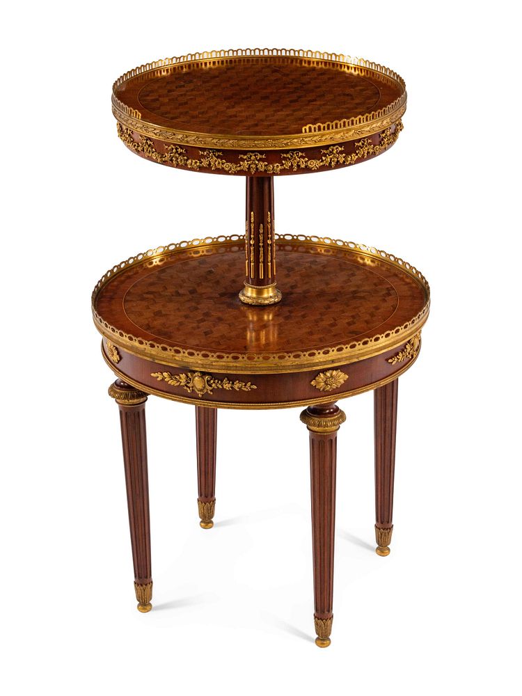 Appraisal: A Napoleon III Style Gilt Bronze Mounted Parquetry Two-Tier Table