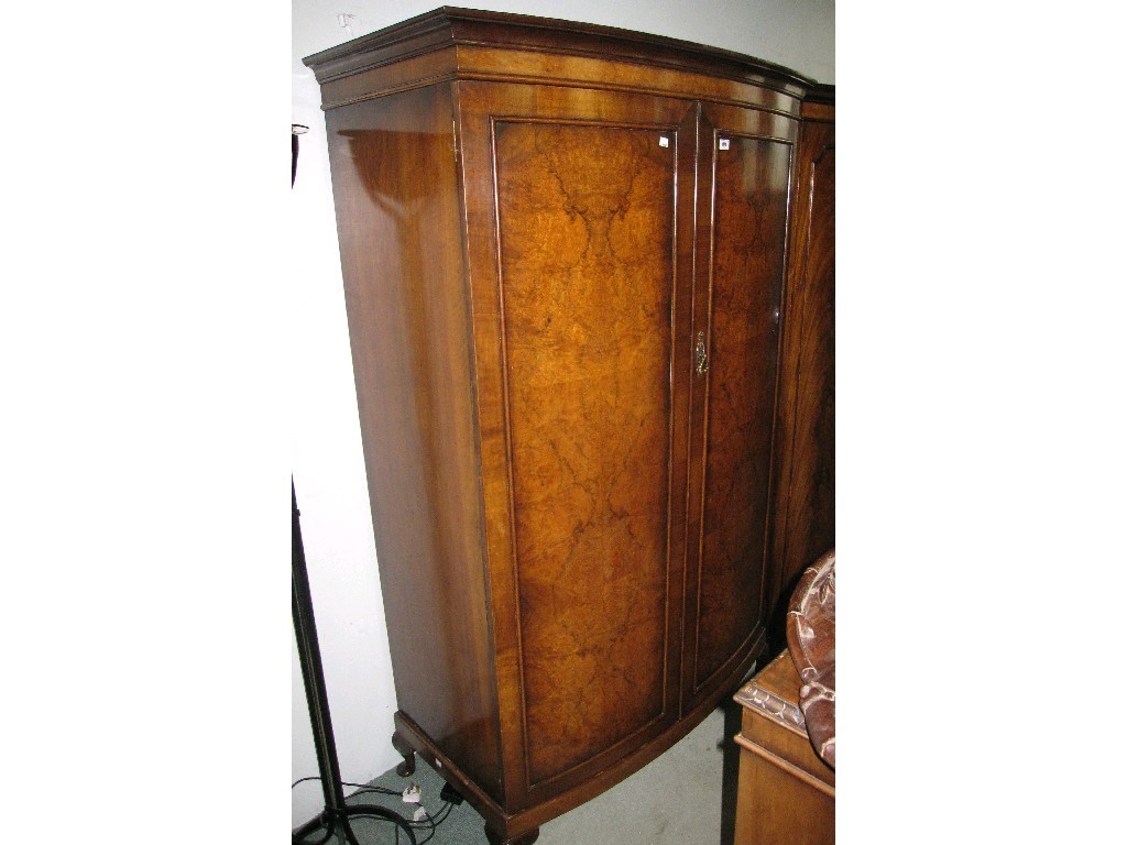 Appraisal: Georgian style walnut bow fronted wardrobe