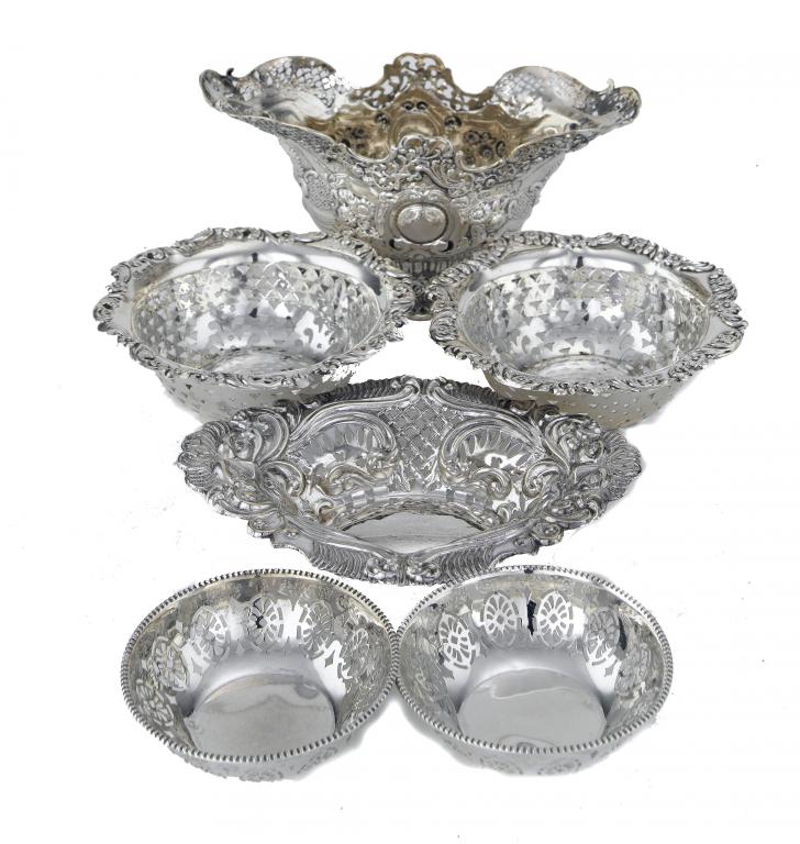 Appraisal: A VICTORIAN BASKET SHAPED SWEETMEAT DISH ANOTHER AND TWO PAIRS