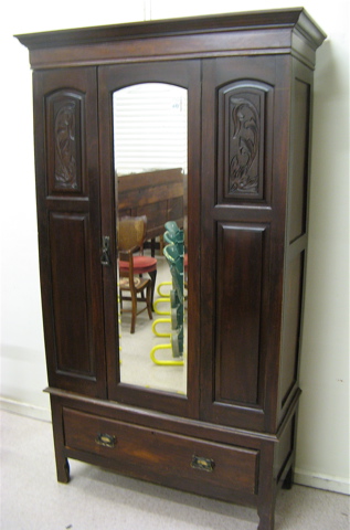 Appraisal: SINGLE DOOR WALNUT WARDROBE English c centering a single door