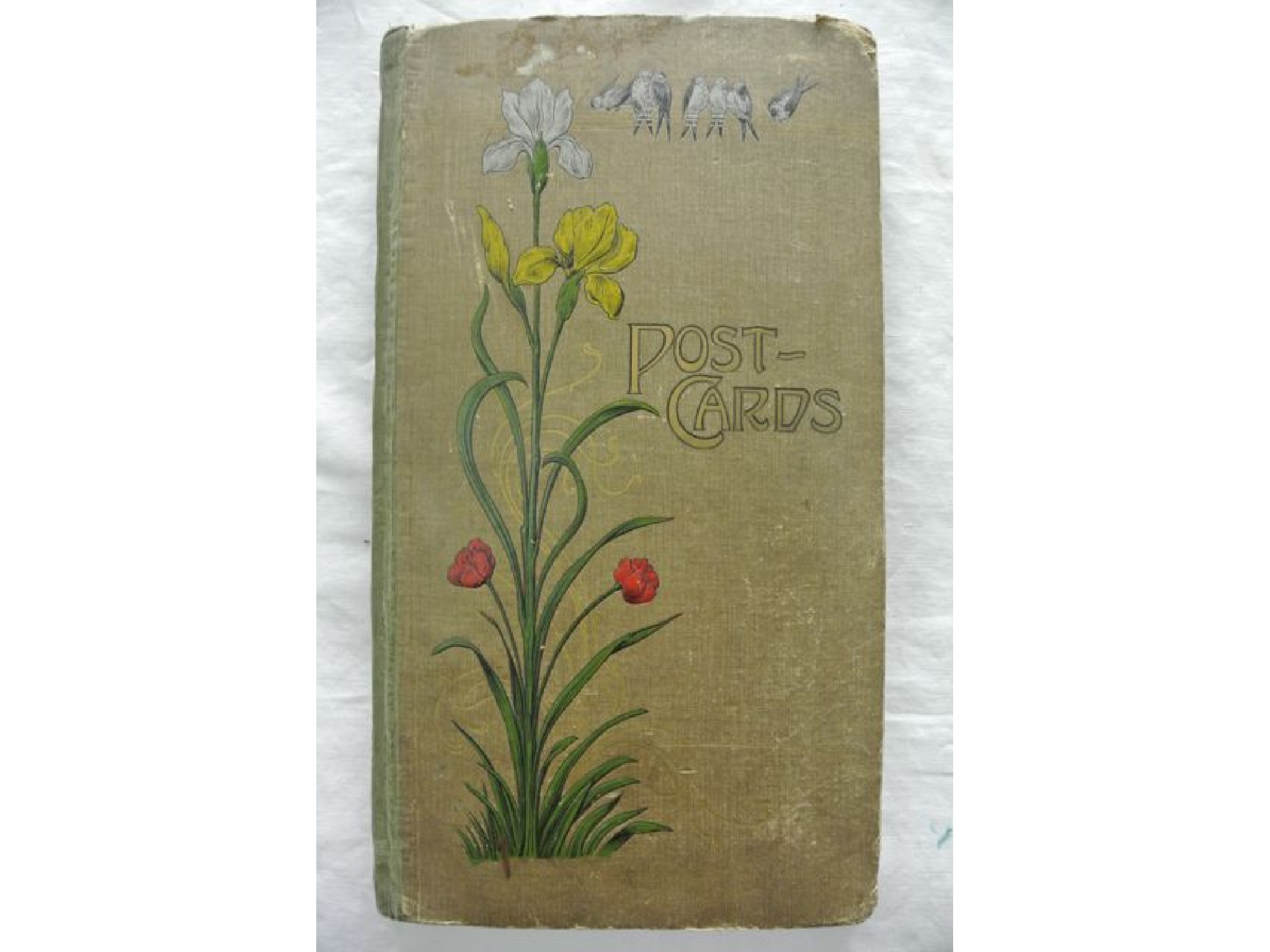 Appraisal: An Edwardian postcard album containing a number of local cards