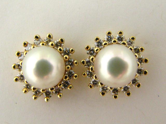 Appraisal: Pair of K yellow gold mm pearl earrings surrounded by