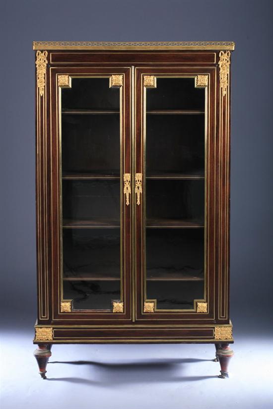 Appraisal: LOUIS XVI STYLE GILT-METAL MOUNTED WALNUT BOOKCASE CABINET th century