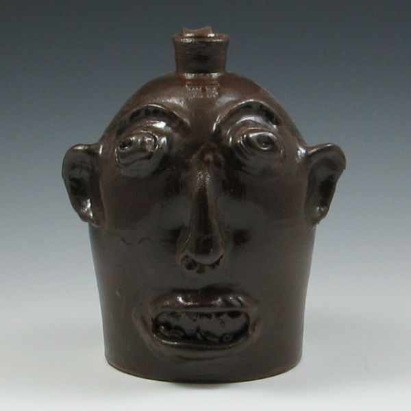 Appraisal: Marvin Bailey Face Jug brown marked with hand incised Marvin