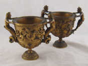 Appraisal: A pair of gilt bronze campana shaped urns with liners