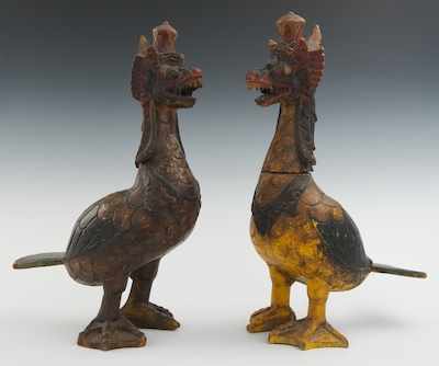 Appraisal: A Pair of Carved Wood Garuda Mythical bird deities apprx