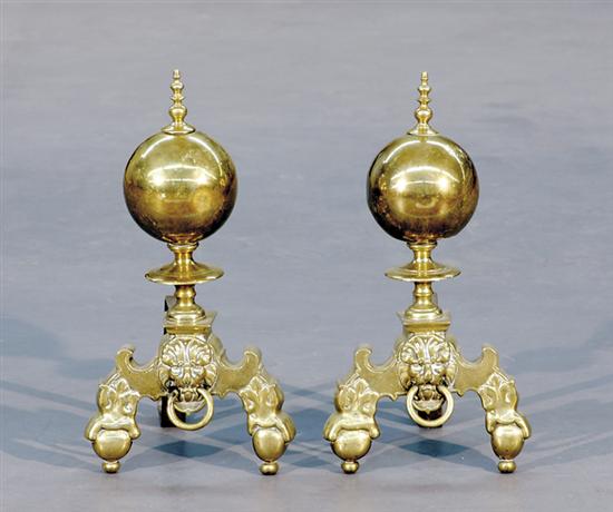 Appraisal: Pair English brass fireguards th century cannonball finial atop shaped