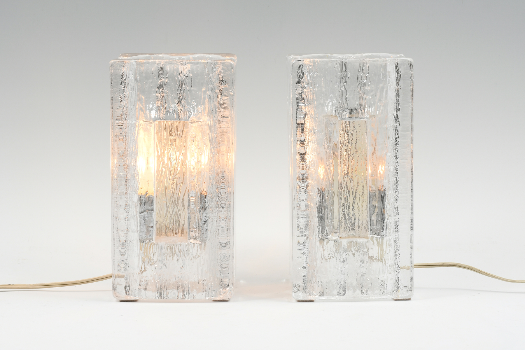 Appraisal: PAIR OF SWEDISH PUKEBERG MODERNIST GLASS LAMPS Pair of Modern