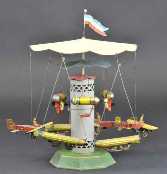 Appraisal: MULLER KADEDER ZEPPELIN AIRPLANE GO-ROUND Germany hand painted and lithographed