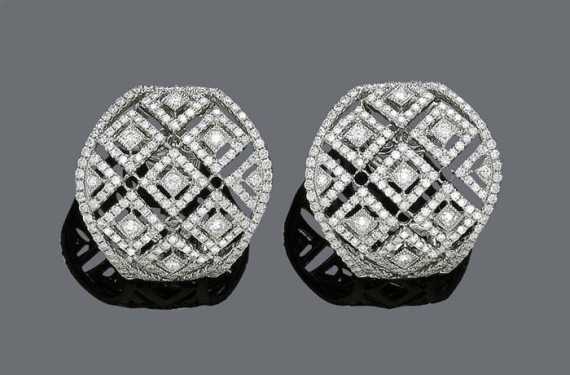 Appraisal: DIAMOND EARRINGS White gold Decorative geometric open-worked earrings with lozenge