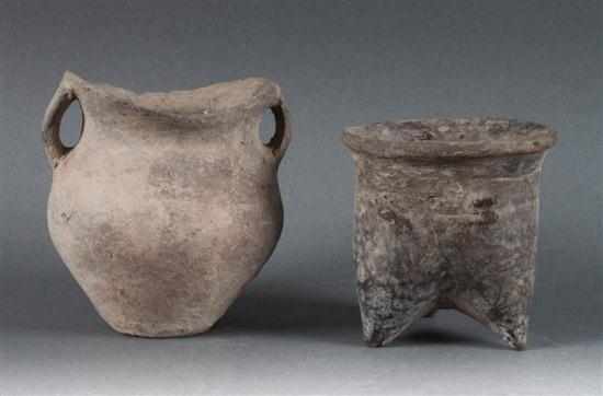 Appraisal: Chinese archaic gray earthenware tripod bowl and double-handled vase believed