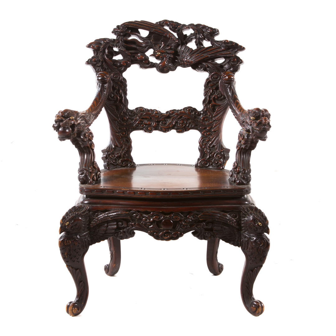 Appraisal: Chinese Export carved hardwood armchair circa s elaborately carved armchair