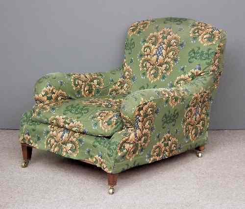 Appraisal: A late Victorian easy chair in the Howard Sons ''Harley''