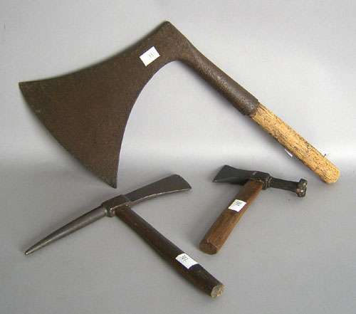 Appraisal: German pole ax together with hammers picks