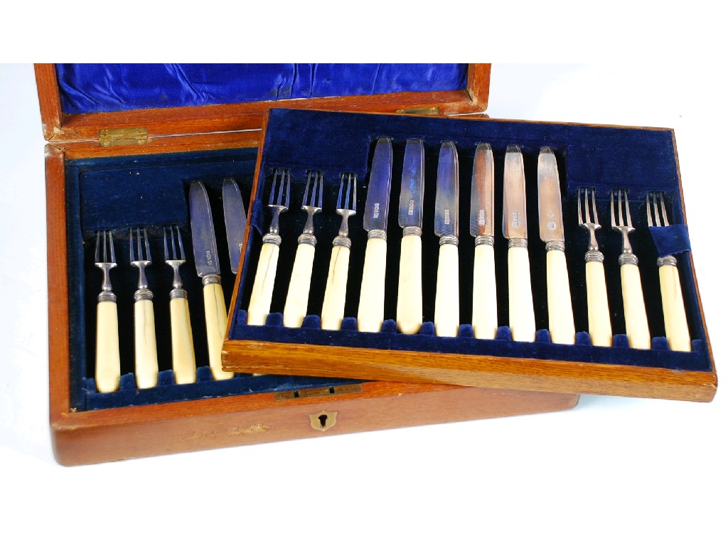 Appraisal: CASED SET OF PAIRS OF DESSERT KNIVES AND FORKS with