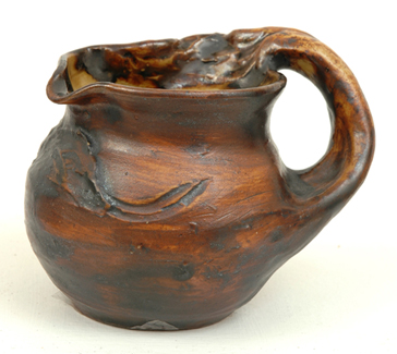 Appraisal: PHILIPPA JAMES Victoria circa Globular flared earthenware branch handled jug