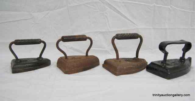 Appraisal: Antique Cast Iron Smoothing Irons 's From the estate are