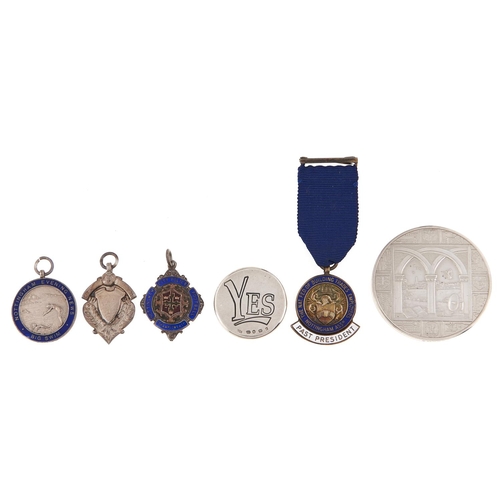 Appraisal: Three silver watch fob medallions a similar badge a commemorative