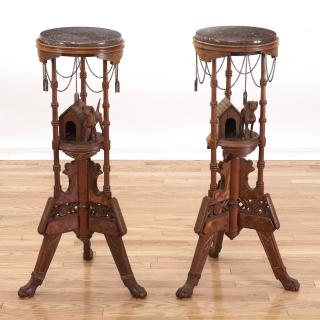 Appraisal: Pair Aesthetic Movement carved walnut fern stands Pair Aesthetic Movement